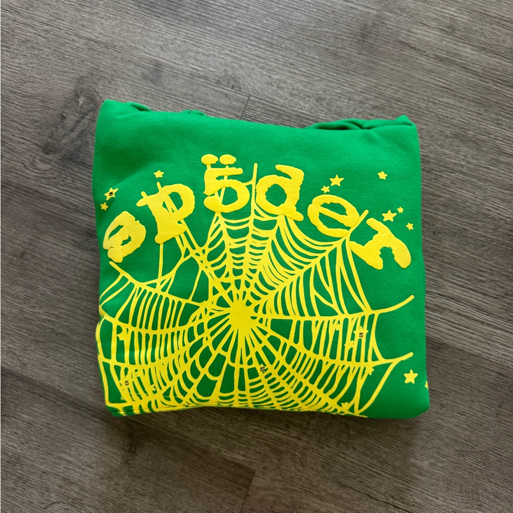 Vibrant Green Sweatshirt With Yellow Spiderweb Graphic